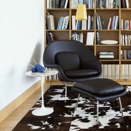 Womb Chair in black leather by Eero Saarinen for Knoll - image: knoll.com 