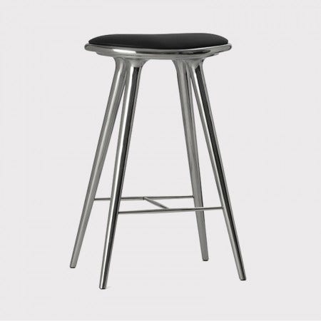 The Mater Recycled Aluminum Stool comes in 3 sizes and is made of recycled aluminum with a black Italian leather seat.