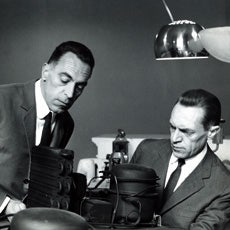 Achille and Pier Castiglioni with their Arco Lamp.