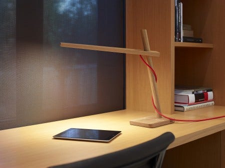 Designed by Dana Cannam and engineered for simplicity and sustainability, Clamp combines the beauty of wood with the brilliance of LED technology. 