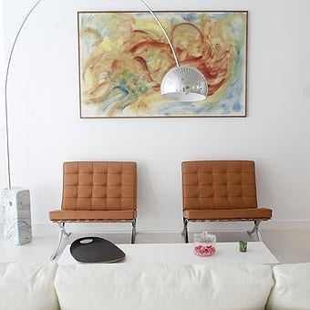 The Flos Arco Floor Lamp was designed by Achille Castiglioni & Pier Giacomo Castiglioni in 1962.  