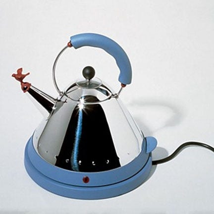 The Alessi Michael Graves Electric Kettle is also available in a stove top version, with a blue, black or white handle.