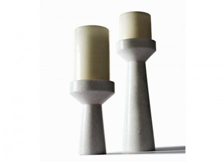 All the Tom Dixon Eclectic gifts and home accessories are designed in London and formed from honest and resilient materials. This candle holder is available in 2 sizes. 