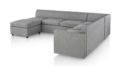 The Bevel Sofa Group offers a club chair, settee, three-seat sofa, corner and chaise lounge units and an ottoman. Available in fabric choices curated by Herman Miller, it has an ebony leg finish.