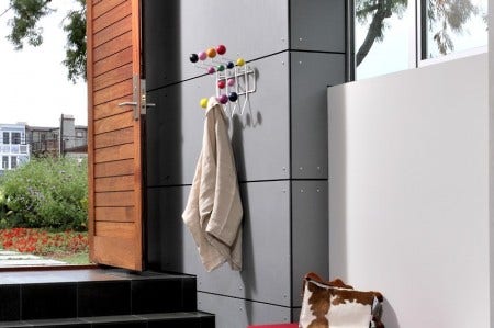 The Herman Miller Eames Hang It All is great for hallways, bathrooms, kid's rooms, anywhere you need to add function and fun. It is available with multi- coloured wooden balls or all-black or all-white balls.
