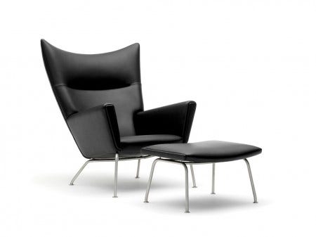 The Wing Chair and Footstool is available in several fabric choices and lots of colourful leather options.