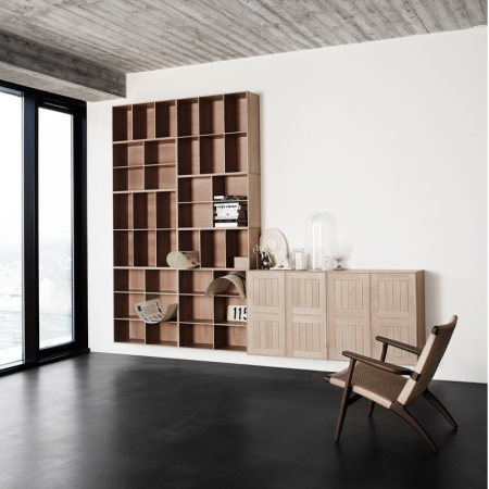 The Carl Hansen Mogens Koch Bookcase system with its square bookcase units offers almost endless flexibility with countless elements. Characteristic of both the design and the craftsmanship are the beautiful dovetail and rabbet joints, which create strength and stability in each module.