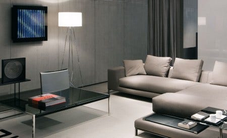 The Ray F Floor Light, designed by Rodolfo Dordoni, 2006, provides diffused light for your cozy interior spaces. Available as a table light and a floor light in 2 sizes.