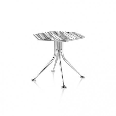 A composition of 216 inscribed triangles makes up the jewel-like, polished aluminum top of the exquisite Girard Hexagonal Table.