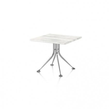 Available in luxurious black or white marble set atop polished die-cast aluminum legs, the Girard Splayed Leg Table offers a modernist take on old world charm.