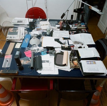 Richard Sapper may have had the messiest desk ever, as seen here in Milan, but you don't have to. Photograph by Ramak Fazel