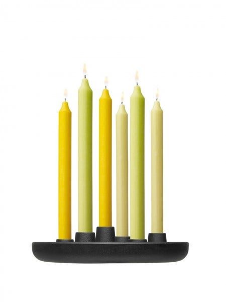 A 2012 winner of the Red Dot Design Award, the iittala Allas Cast Iron Candle Holder is a new interpretation of the tradition candelabra. Norwegian designer Anders Engesvik combines the heaviness of cast iron with the lightness of tall and comforting candles.