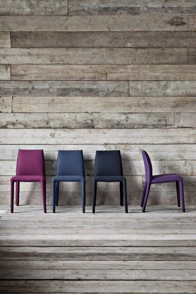 The Pianca Kelly EMI Chair is flexible and soft. It is available in leather or fabric. Perfect for pairing with the Pianca line of dining tables.