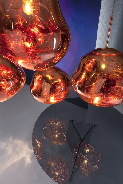 Melt is translucent when on and mirror-finished when off. Available in chrome, copper and gold. And also in a mini version.