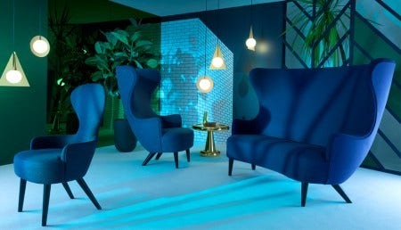 The Tom Dixon Wingback Collection of seating is available in a very highly curated collection of fabrics and a choice of black or copper legs.