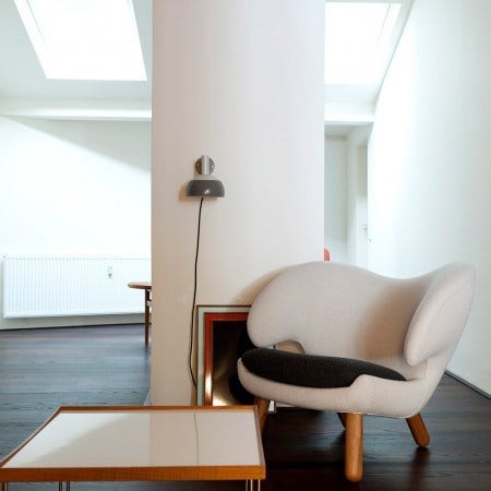 In 1963, Finn Juhl designed a series of lamps that were only in production for seven years and are nowadays both rare and coveted as collectibles. They are now back in production at Onecollection, in the original combination of two shades of gray. Available as a wall lamp, a table light and a pendant light.