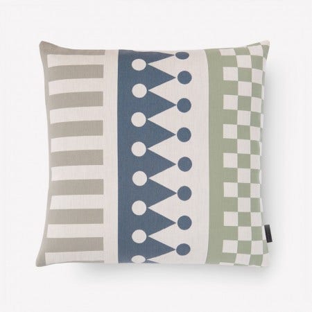 The Maharam Palio Diagonal Stripe Pillow was designed by Alexander Girard.
