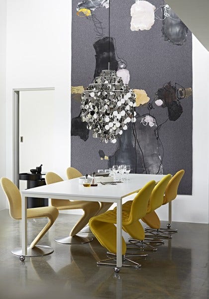 The Verpan Fun Lighting Collection includes pendants, table lamps, wall lamps and the amazing hanging lights which are large and visually stunning chandeliers. The finishes on the disks are either Mother of Pearl or metal.