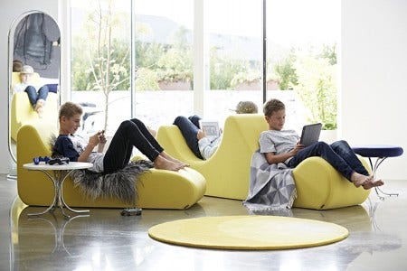 Designed in 1969, this low lounge seating system creates its own landscape. Available in a colourful range of fabrics.