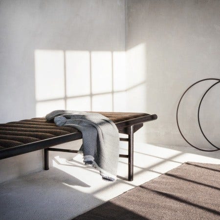 Menu Square Throw: Designed in different tones of grey, the way you fold the throw