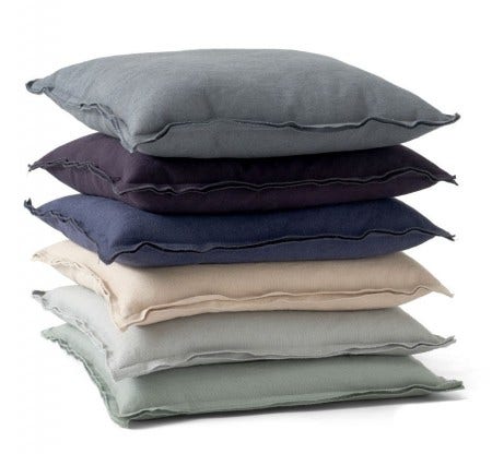The Menu Raw Cushion is available in six earthy tones. Layer them with other natural colours to give warmth to a space.