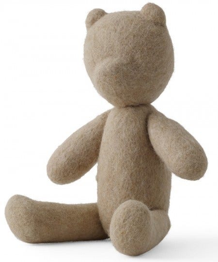 The pure shape and material of the Menu Afteroom Teddy gives lots of room for active imaginations, helping bring peaceful, cozy moods to your home life. 100% wool in six color options.