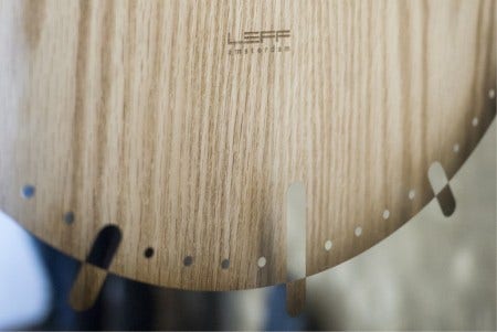 Available in natural oak or black.