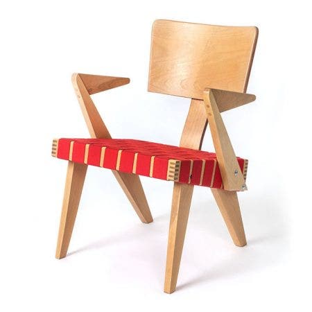 Originally created in 1950 by Russell Spanner, the Lounge Chair with Arms has become a classic of Canadian Mid-Century Modern furniture design. Out of production for more than 50 years, Gus* worked in collaboration with the Spanner family to revive this iconic chair, carefully matching the construction, materials, and design details to stay true to the original in every way. The seat is woven strapping, and the frame is solid birch with exposed bolts and finger-joint details. Like the original, the Lounge Chair with Arms is built in Toronto and available in a variety of finishes.