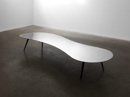 The exhibition at the Ben Brown Gallery includes such pieces as the Puddle 21, 2015, a signed and numbered table with a mirror polished stainless steel top.