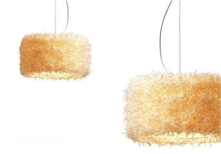 The Ango Snow Circle Pendant Light is made of Mulberry Tree bark that is harvested in autumn and then boiled and beaten by hand. The fibers are then hand-sewn to the diffuser frame to create a soft white, unique ceiling light.