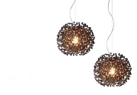 The Ango Midnight Moon Pendant Light is made of ebony black silk cocoons.