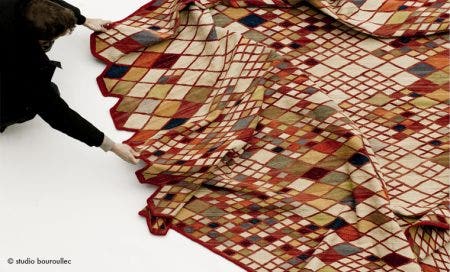 Technically complex, the Losanges collection requires great skill as it involves combining 13 colours through the geometrical rhombus shape, a great challenge for the craftsmen of Northern Pakistan. As well as being crafted by hand, the Afghan wool is also spun by hand, which allows for some unique colour tones to be highlighted which make each rhombus different and each rug a unique item.