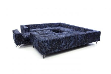 They say that no man is an island, but what about enjoying your own private island within the safe walls of home? This new concept is created by two Zliq sofas facing each other, with the addition of an extra component in between.