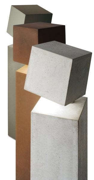 The Vibia Break Lamp is available in two sizes and two finish options. Made of concrete.