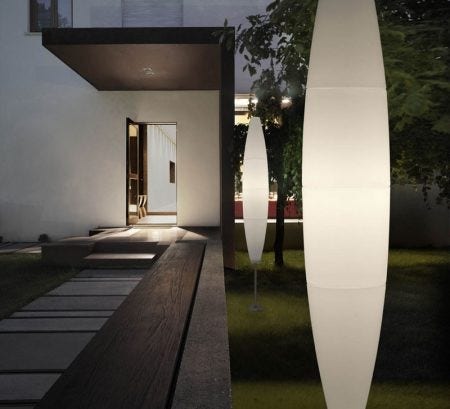 The Foscarini Havana Outdoor Lamp is made of a single rotational molded piece of white polyethylene. The lamp is available in three base options: with a stake, with an underground box or with a repositionable base.