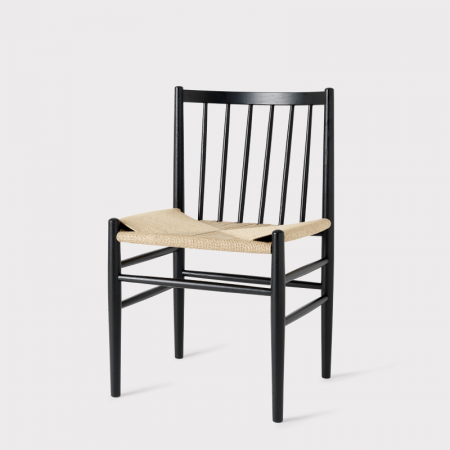 The Mater J80 Chair was designed by Jørgen Bækmark in the 1950s. The combination of the wooden frame and the woven paper cord seat provides a unique seat that molds to your body.