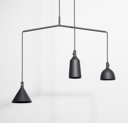 The Menu Cast Pendant Lamp takes inspiration from the traditional plumb weight – a weight hanging from a line used by masons and carpenters since Ancient Egypt to establish a true vertical. Hang one lamp on its own or cluster several into an installation. The lamp is available in three variations, and is designed for both commercial and residential use.
