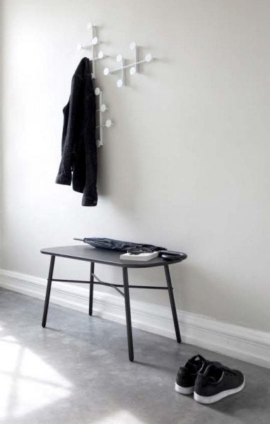 The Menu Meet Bench / Table, designed by Norm Architects, is a versatile, multi-use piece, and its name refers to the two stabilizing tubes that elegantly join under the seat. The bench is also just big enough for two people to sit together – and 'meet'. The removable top cover is felt, and the legs are powder-coated steel.