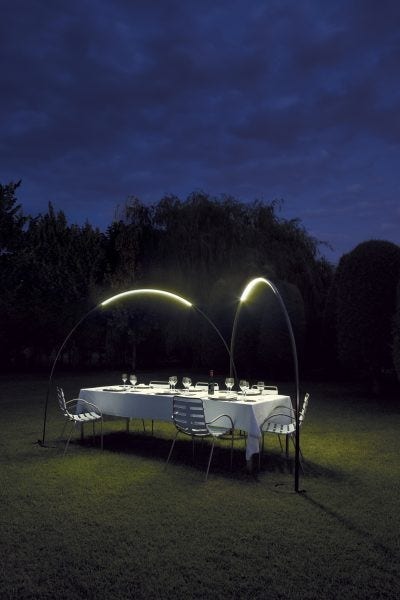 The Vibia Halley Floor-to-Floor Outdoor Lamp works Just like a comet, radiating an arc of light that creates a relaxing and comfortable environment. The slim form of the Halley is made from highly durable yet lightweight materials making it easy to move and assemble while meeting the highest standards of quality and durability.