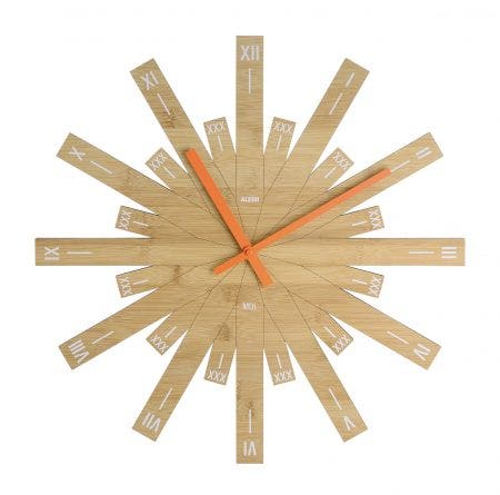 The Alessi Raggiante Wall Clock designed by Michele de Lucchi introduces his wall clock, inspired by the sun that illuminates and paces the day. The designer favours natural materials which transform, improve even, over time: for this object, he chose bamboo, giving rise to an industrial product that retains the characteristic features of an item that is a cross between art and handicraft.