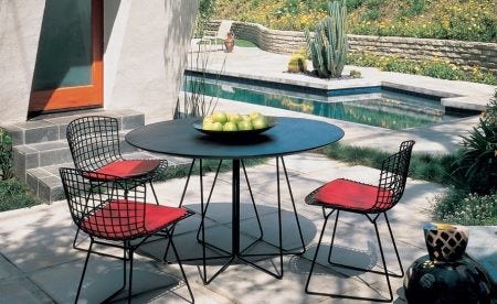The Knoll Vignelli Paperclip Cafe Table was designed as a companion to the Handkerchief Chair and the Bertoia Collection. The Paperclip Table by Lella and Massimo Vignelli uses the same material vocabulary to achieve a similar lightness and elegance.