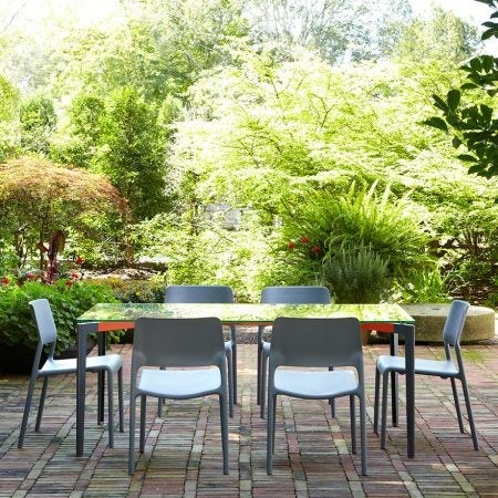 The Knoll Chadwick Spark Stacking Side Chair brings energy to any room or patio, with its bright colors and unique personality. A perfect balance of design and utility, the chairs are pleasing to the eye, comfortable and versatile. They stack six high.