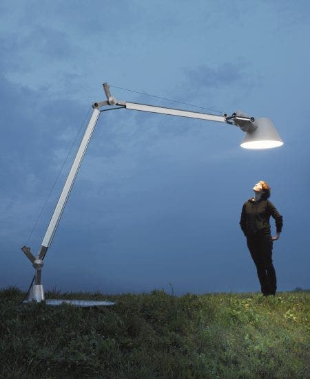 The Artemide XXL Floor Lamp was designed by Michele De Lucchi in 1987. It earned worldwide recognition for its perfect marriage of design and engineering. Tolomeo XXL’s towering size gives the fixture a majestically powerful presence, becoming a statement piece when its grand iconic features are made part of any outdoor environment.