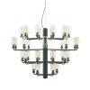 Gold glass with green textile cord and white ceiling canopy
